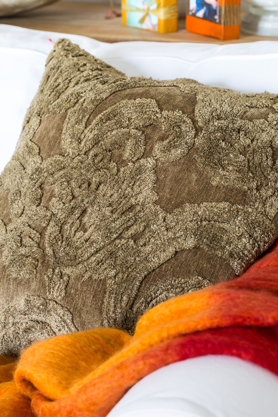 Pottery Barn Fall Pillow Cover on a sofa