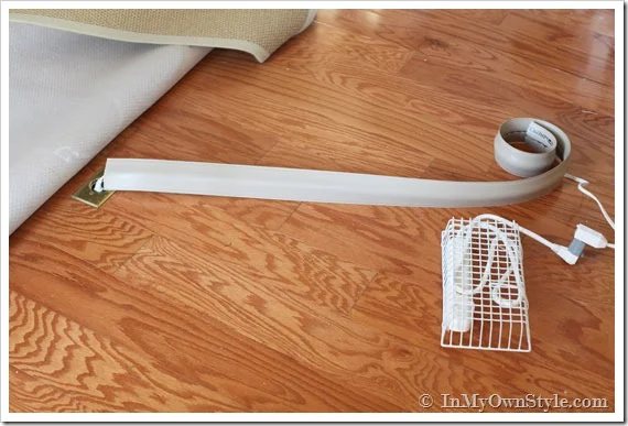 vinyl cord cover and wire basket on floor