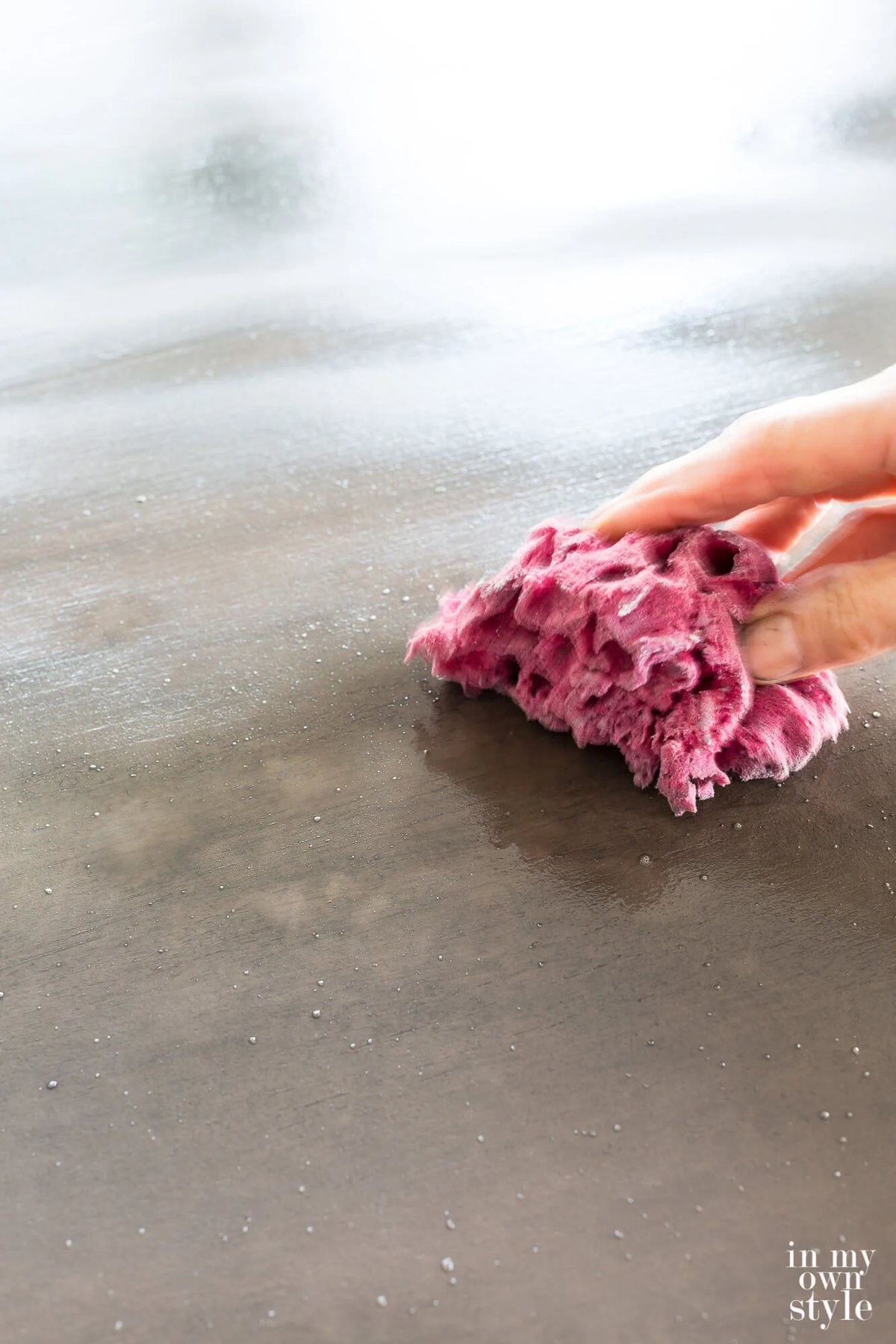 removing paint with a sea sponge
