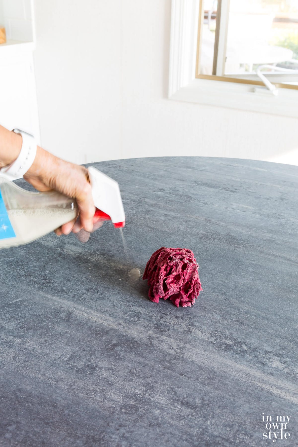 Apply water over wet paint and sponge it off