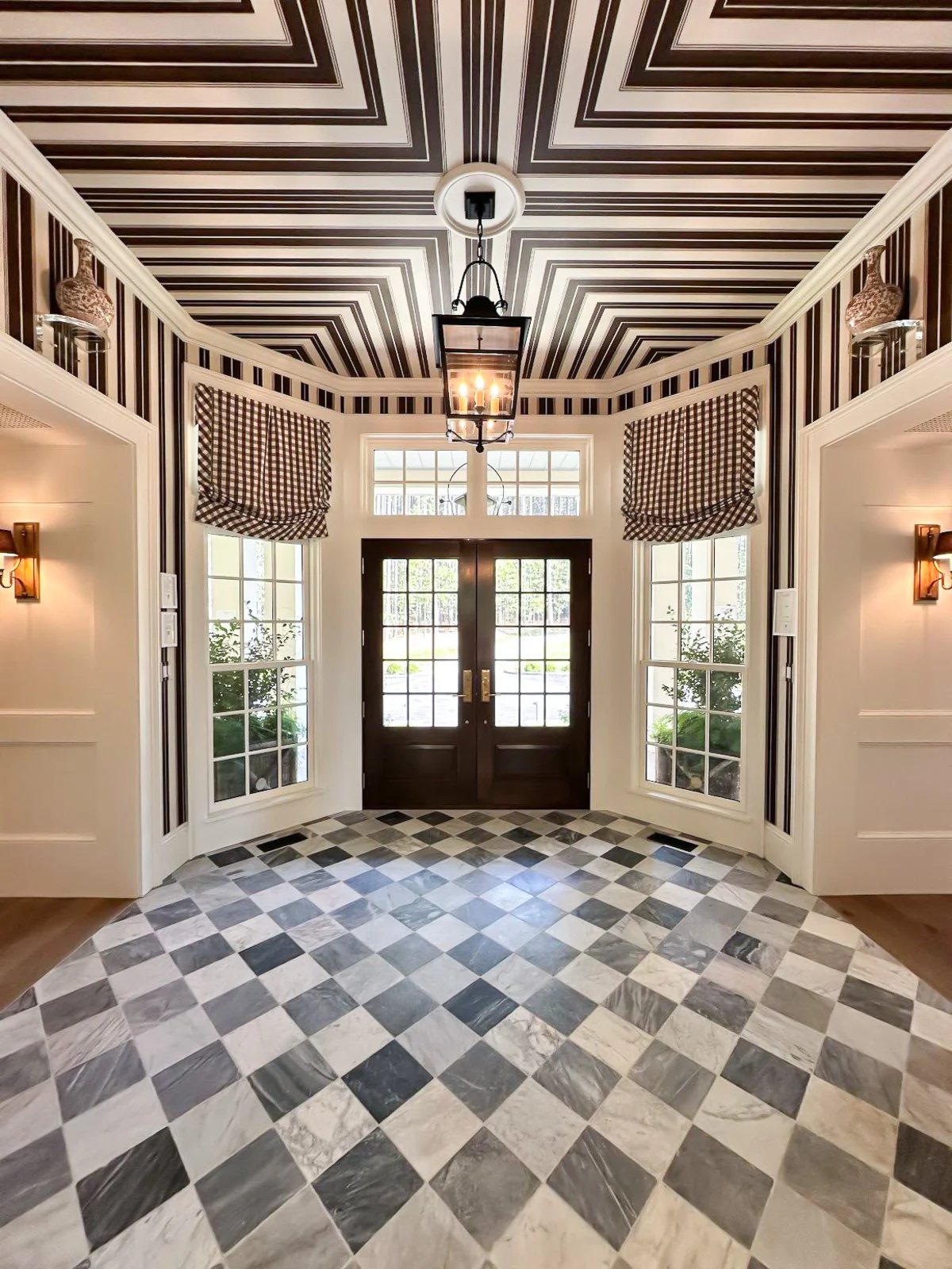 brown and white foyer in the Southern Living Idea House 2025