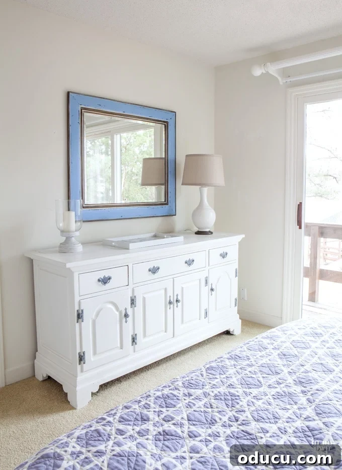 Use what you have decorating by repurposing furniture and using it for purposes other than it was intended for. A white dresser, once part of a hutch, now serves a new purpose.