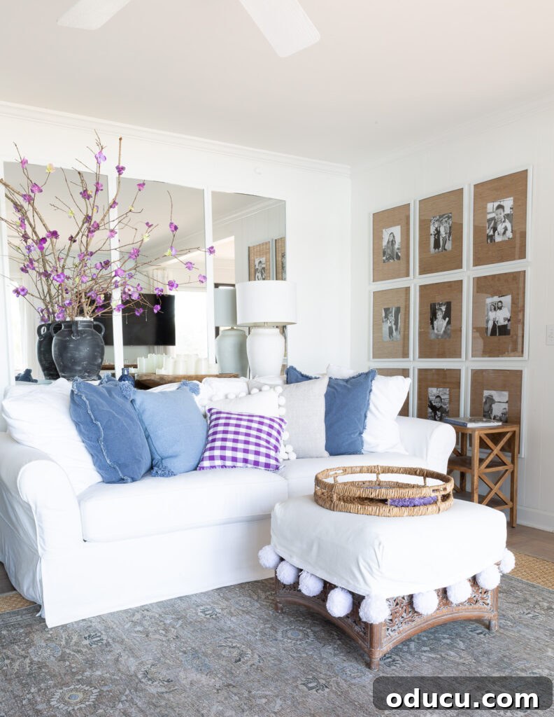 Corner of white wall living room with blue and purple accents.