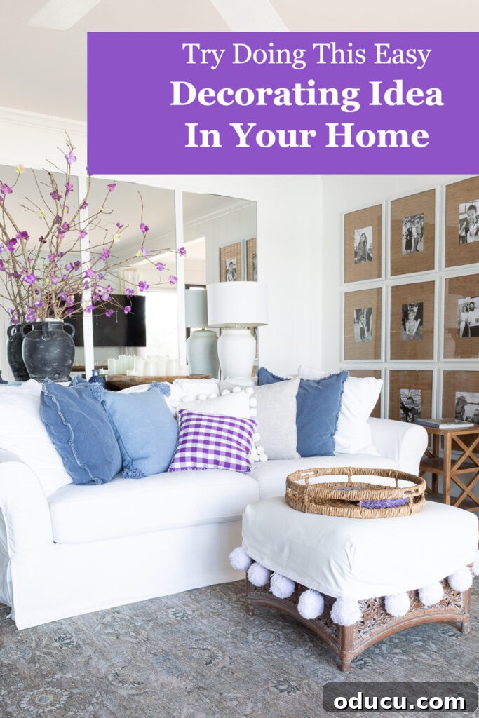 white furniture in a living room with blue and purple accents.