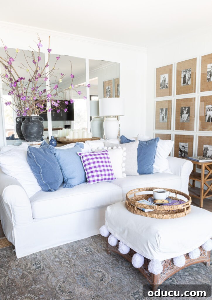 Corner of white wall living room with blue and purple accents.