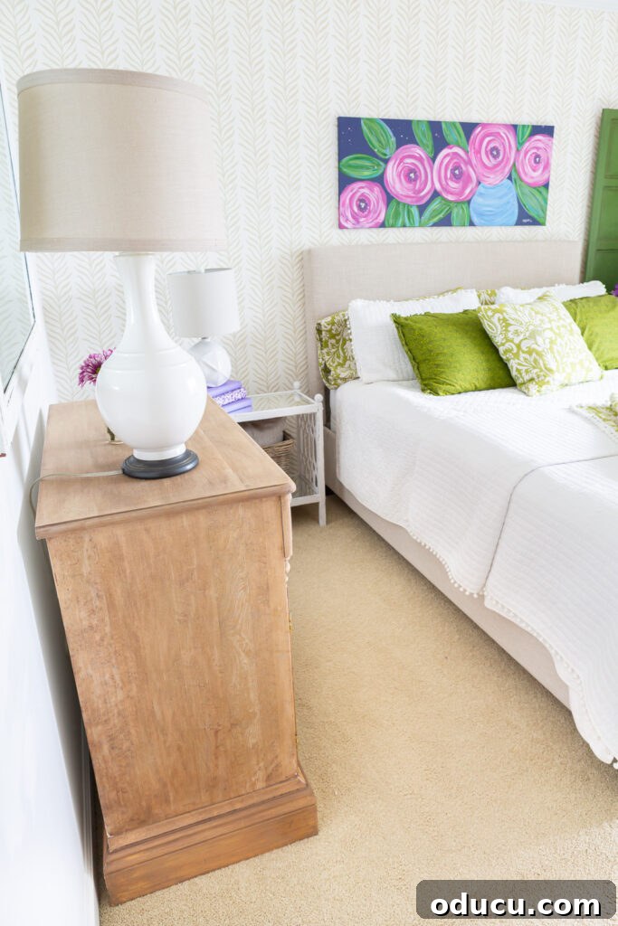 The Transformed Cabinets 14 A serene guest room featuring the beautifully stripped and refinished wood cabinet against a light-colored wall, creating a harmonious and inviting space