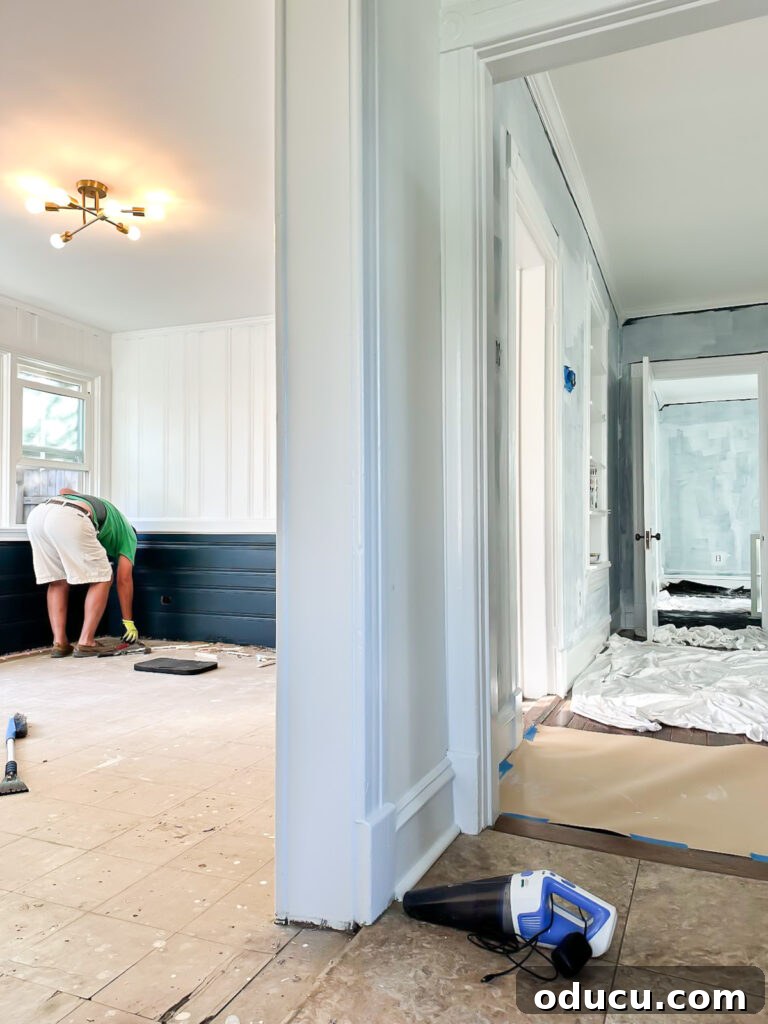 View of the first floor from the kitchen, showing the sunroom entrance.