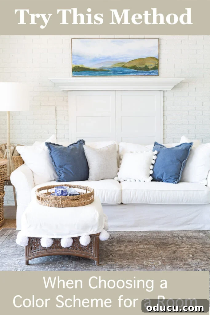 A beautifully decorated white and blue living room with overlay text: 'Try this method when choosing a color scheme for a room'.