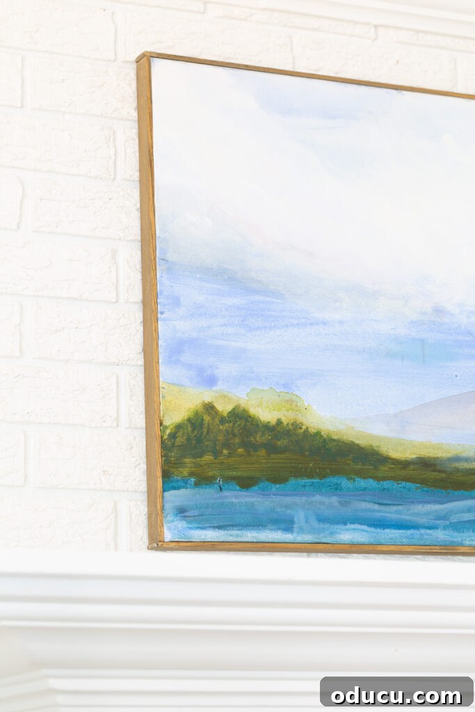A close-up view of the custom-framed art canvas, elegantly hung on the living room wall.