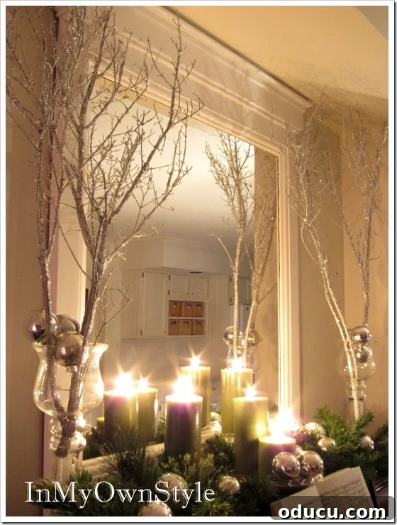 Spray-Painted-Icy glittered Tree-Branches being used to decorate a home for the holidays. Spray-Painted-Tree-Branches Decorating Ideas for Christmas