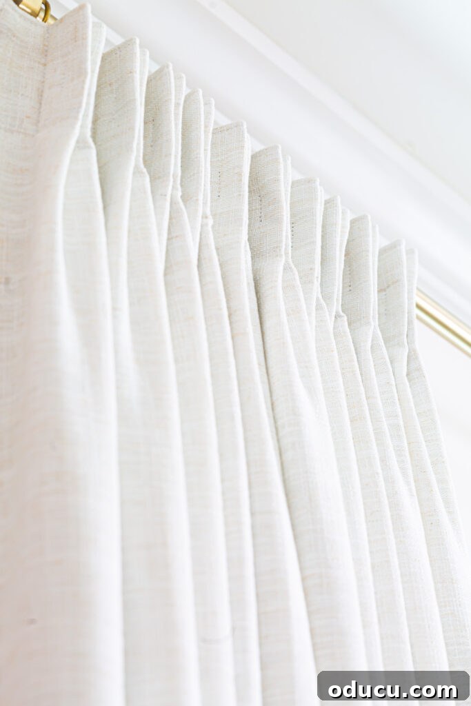 THY Curtains Adorn Every Space Beautifully 16 A close-up shot of the impeccably tailored drapery pleats, demonstrating the high-quality finish and attention to detail.
