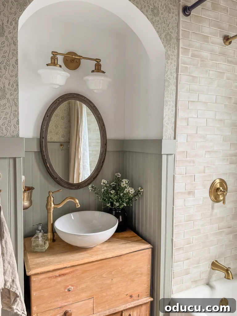Fashion Forays 2 English cottage inspired bathroom with vessel sink and antique cabinet, exuding vintage charm and DIY touches.