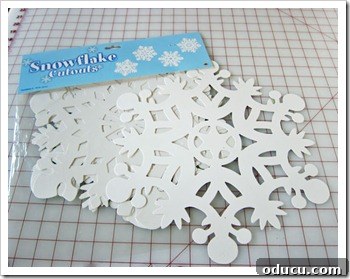 Snowflake-Cutouts Large paper snowflake cutouts for holiday table decor