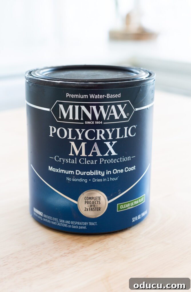 Quart can of Minwax Polycrylic Max in an Ultra Flat Finish on the wood countertop.