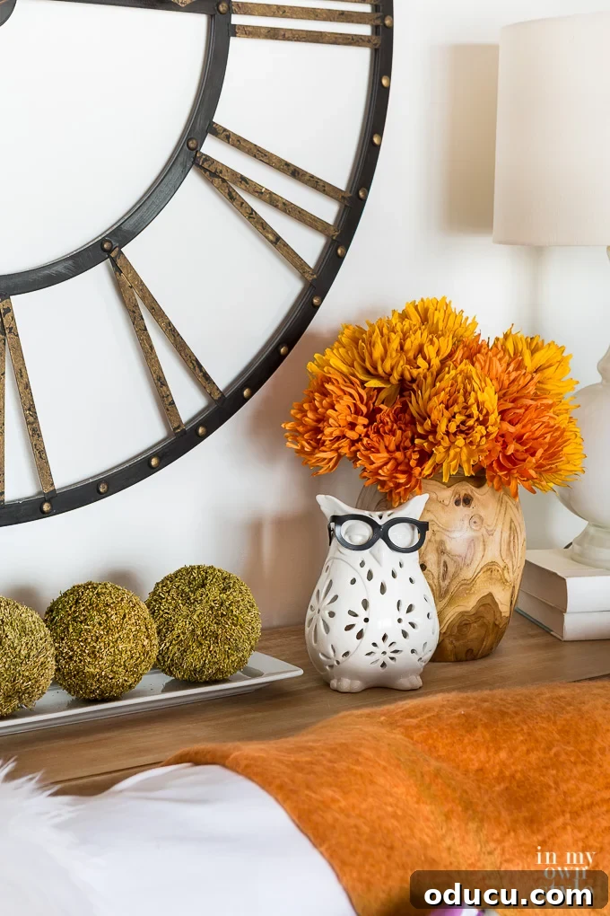Fall Decor Reimagined 18 White owl candle holder and fall decor on sofa table