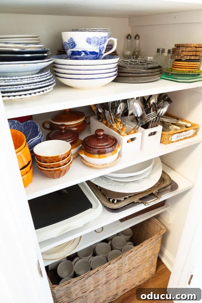 Fall Decor Reimagined 8 Looking into a china closet where I store fall and autumn colored plates and tableware.