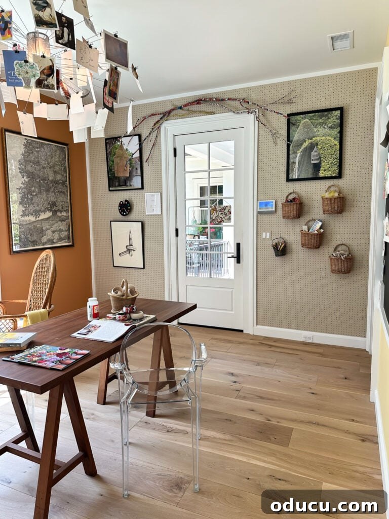 Shaping Tomorrow's Home: Inside the Southern Living Idea House 2025 27 craft room wall covered with pegboard panels