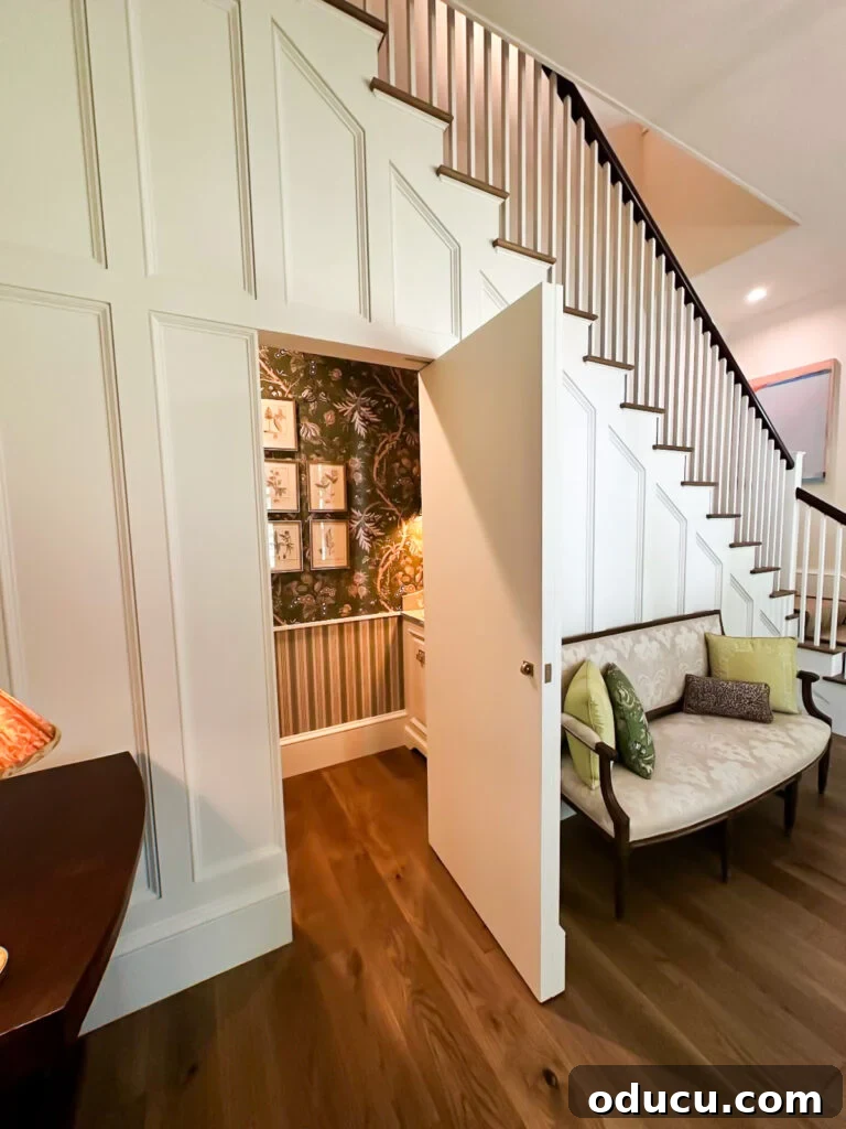Shaping Tomorrow's Home: Inside the Southern Living Idea House 2025 36 staircase wall with hiddn door