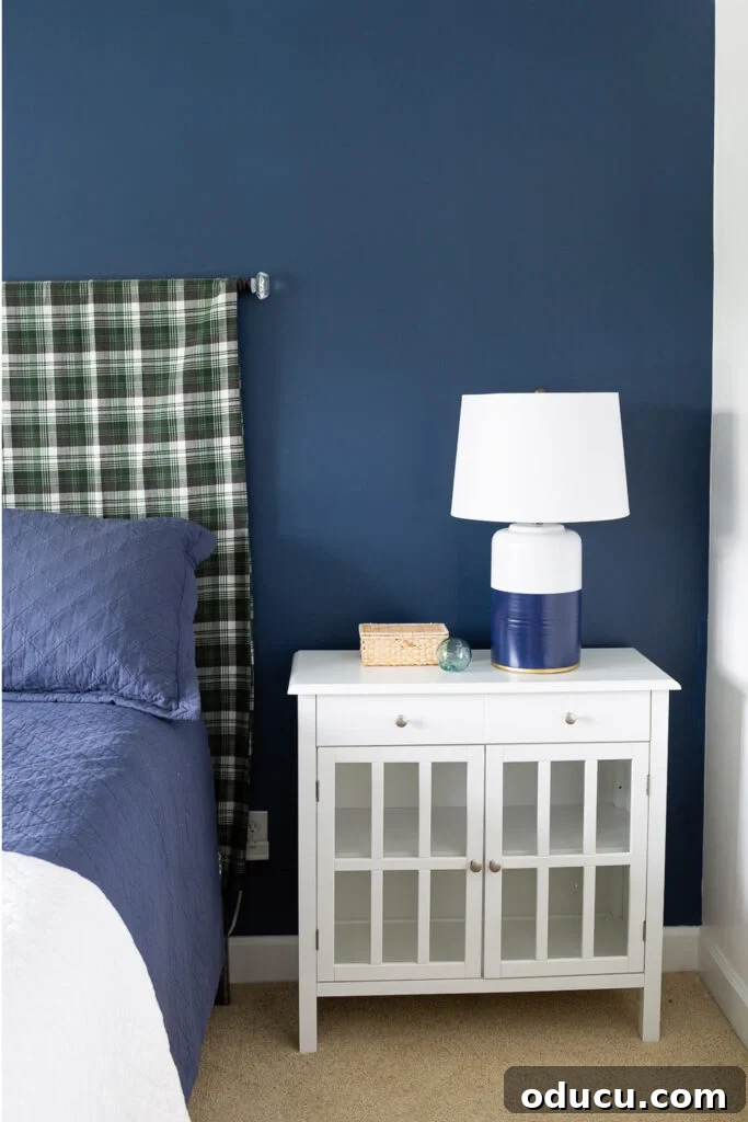 Reimagining the Blue Guest Oasis 3 Blue and white guest room with green accents before makeover.