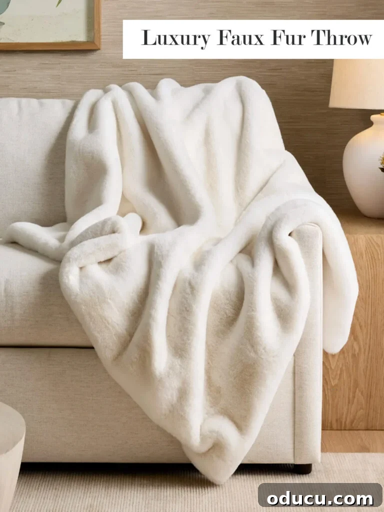 Reimagining the Blue Guest Oasis 5 Quince Faux Fur throw in white
