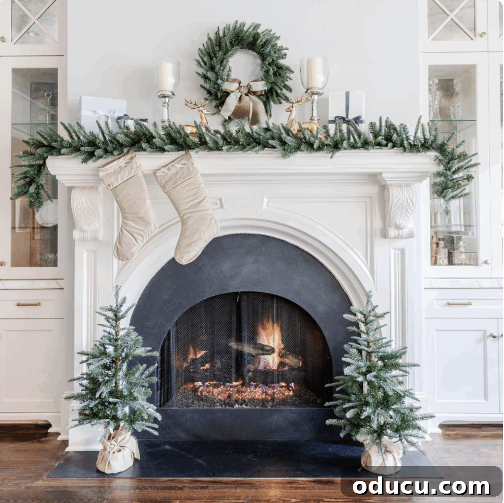 One King of Christmas Fir Set for Three Stunning Holiday Rooms 3 King of Christmas Noble Fir Set around a fireplace and on mantel.