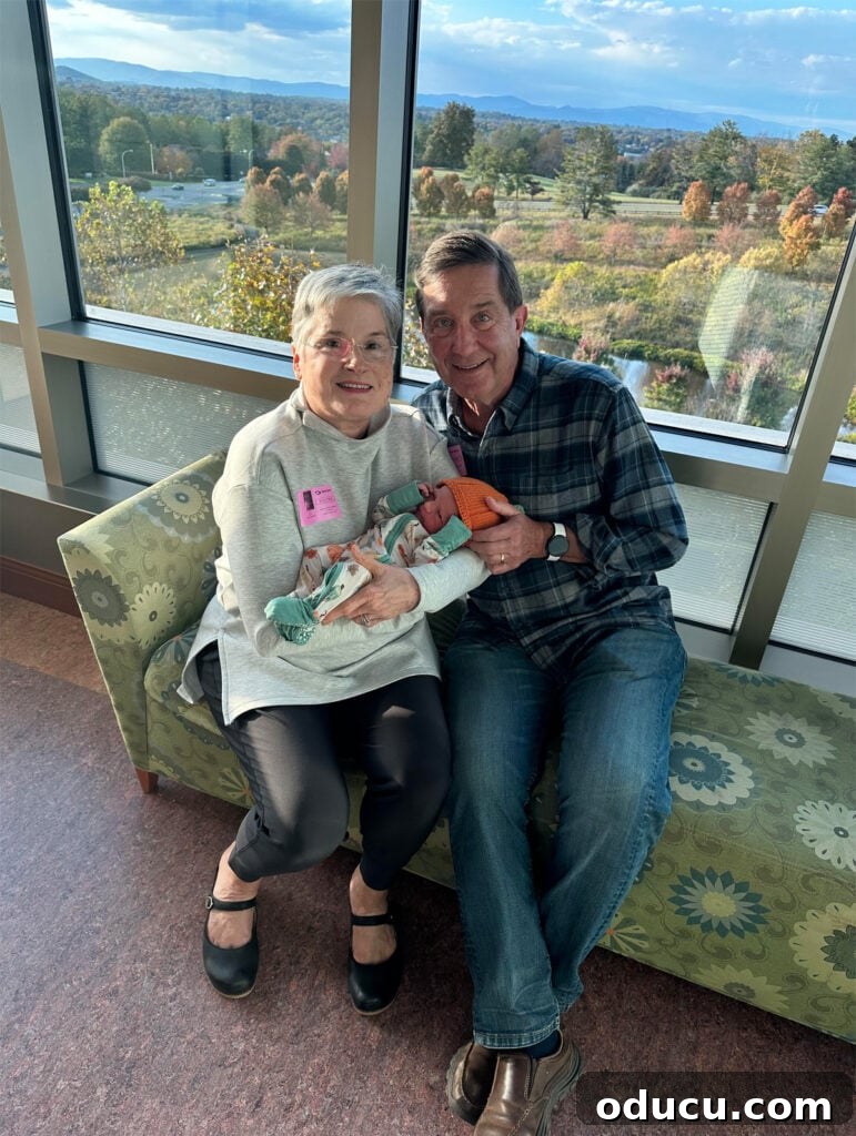 Style Chronicles 2 A heartwarming image of a grandparent holding a newborn baby, symbolizing new beginnings and family joy.