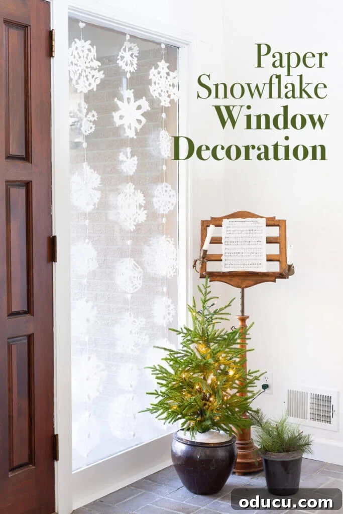 DIY Paper Snowflake Window Displays 17 Elegant Christmas window decorations indoors: hanging paper snowflakes create a festive and cozy atmosphere. Step-by-step photos and templates make snowflake making easy.