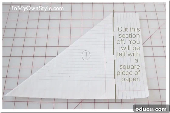 DIY Paper Snowflake Window Displays 6 Step 1: Folding paper to create a square base for snowflake making.
