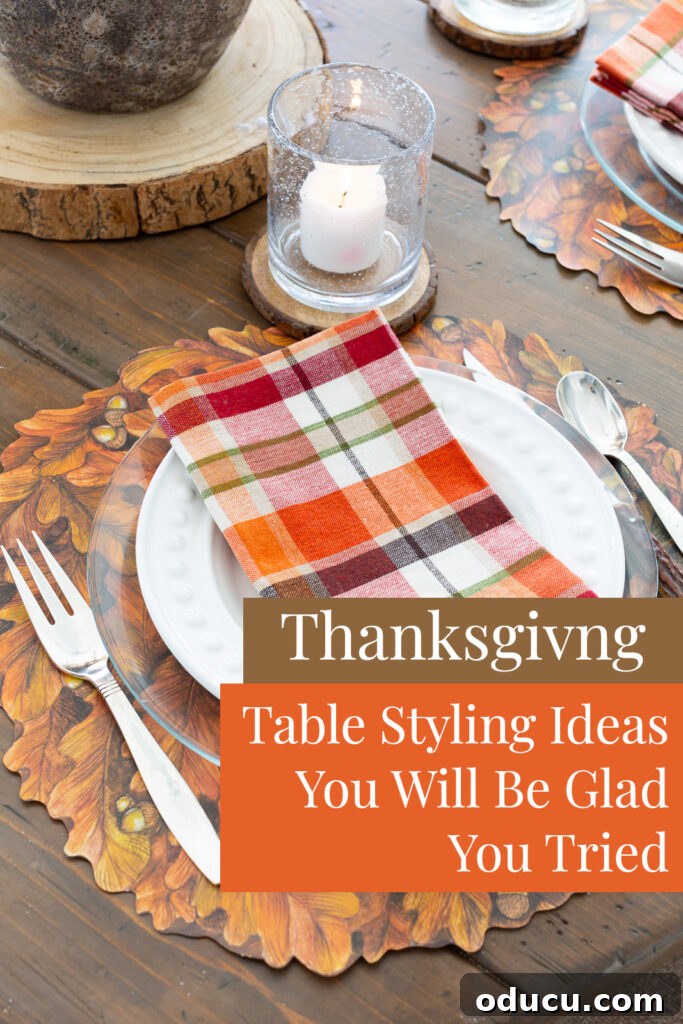 Thanksgiving's Functional and Festive Focal Point 12 A beautifully arranged Thanksgiving table setting on a rustic wood plank table, featuring autumn decor and elegant place settings. Overlay text: 'Thanksgiving table styling ideas you will be glad you tried.'