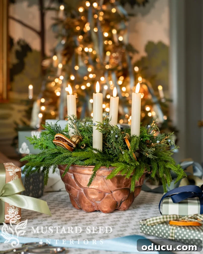 Fashion Finds 272 2 Copper mold used as a Christmas candle centerpiece, adorned with greenery and berries