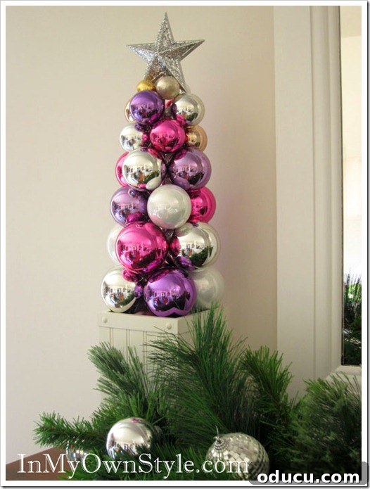 Ornament Tree in Planter A stylish tabletop ornament tree displayed within a decorative planter, showcasing an alternative way to present this DIY Christmas decoration.