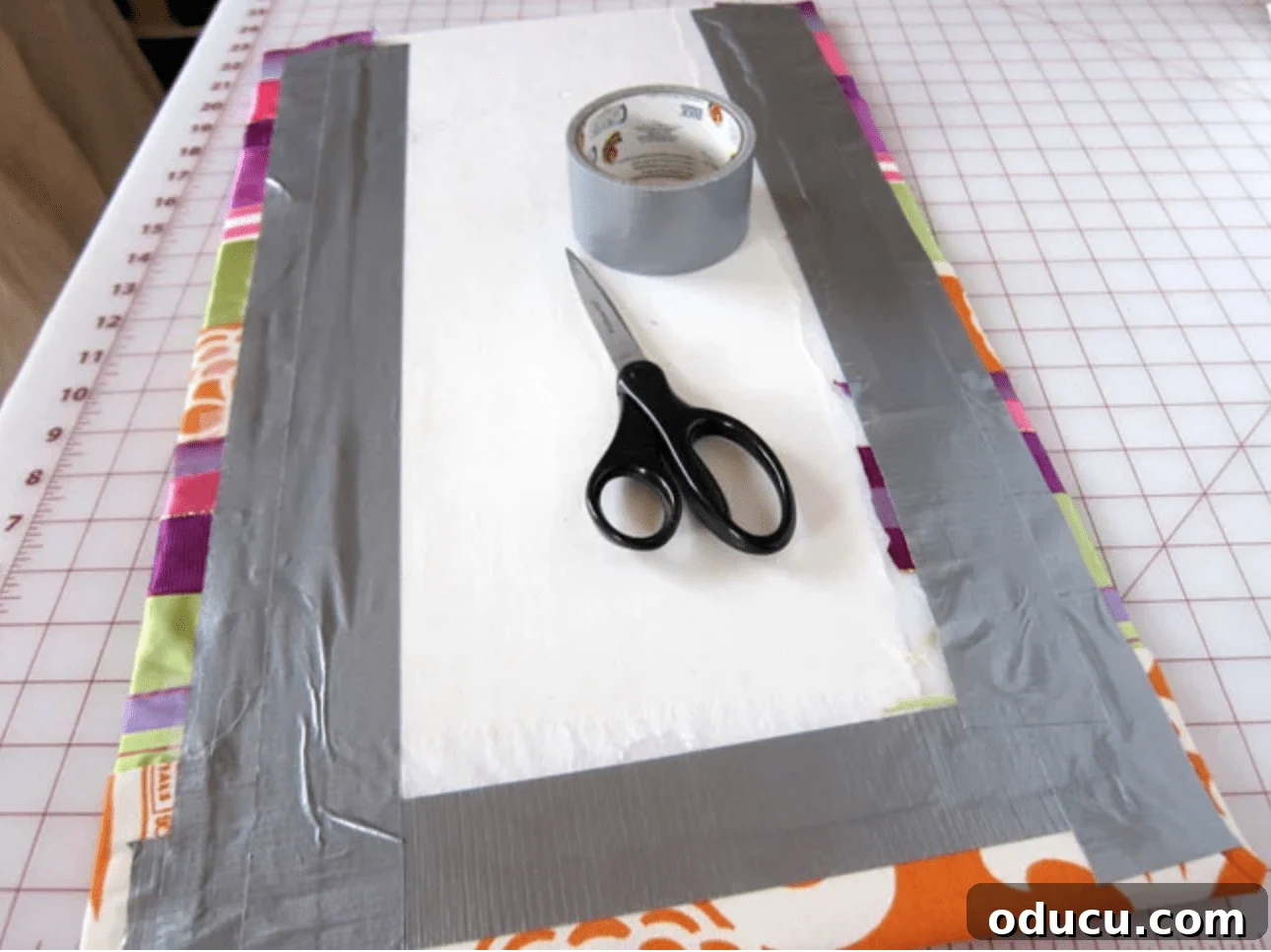 Craft Your Own Stylish Ribbon Memo Board 6 Detailed view of the back of the memo board, showing neatly secured ribbon ends with duct tape