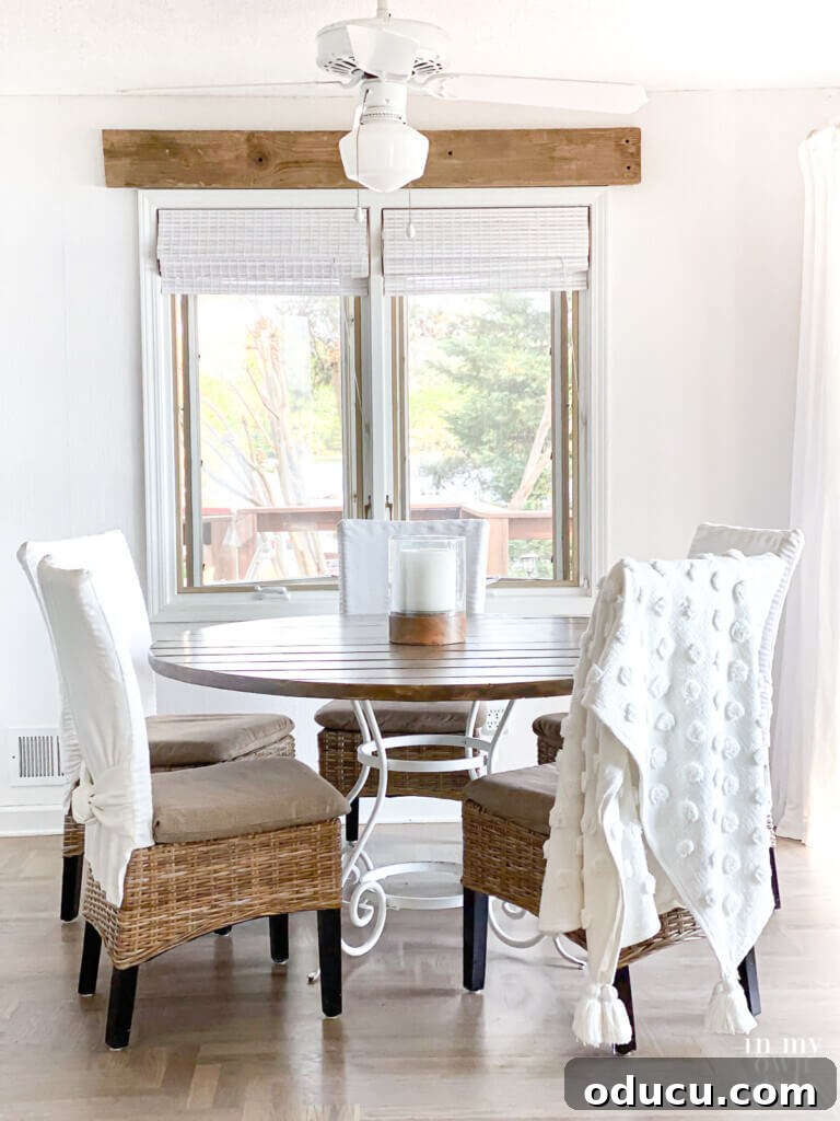 Smart Ways to Paint Window Trim Like a Pro 12 Newly made DIY pine wood board round table on white metal table base.