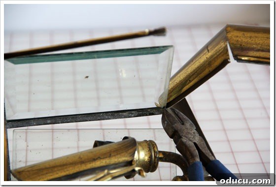 taking apart brass light fixture to repurpose the glass to make a pretty DIY paperweight.