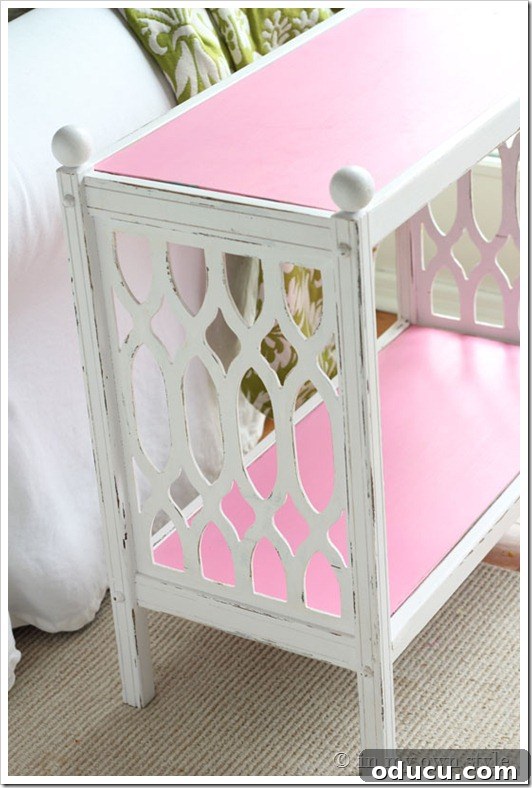 pink-to-go-with-teal White chalk painted side table with a bright pink interchangeable top panel next to a teal cushion.