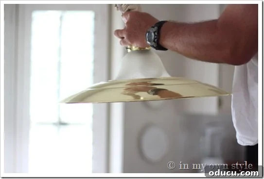 How to paint a brass light Before shot of a brass light fixture
