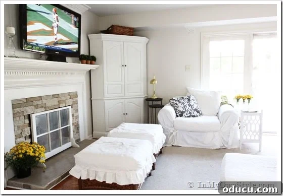 painted concrete fireplace hearth on family room