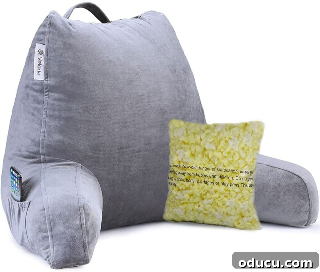 Stylish Dorm Room Decor for Less 6 A back rest pillow that is a must when buying what you will need to take to college and decorating a dorm room.