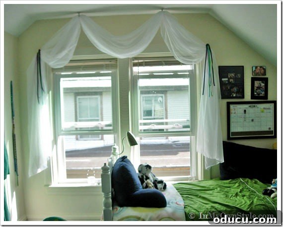 Dorm Room Decor College apartment showing a creative DIY idea for a window treatment and bed.