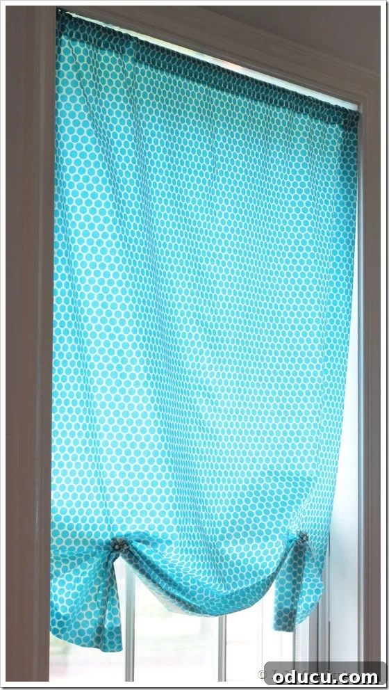 Easy no sew window treatment featuring a double-clipped design.