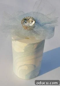 Genius Ways to Repurpose Film Canisters 2 Crafting with film canisters using a mother of pearl button and tulle