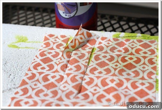 Autumn-Decorating-Ideas-wit Autumn-Decorating-Ideas-wit - Applying spray adhesive to napkin strips.