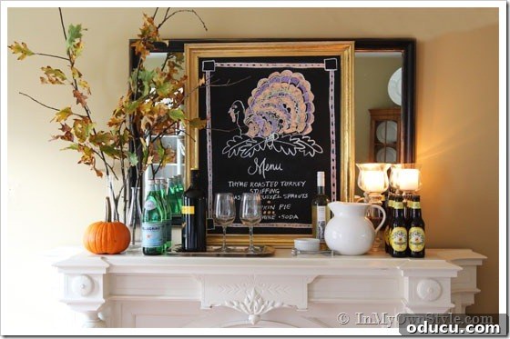 Autumn Mantel-Side-Board A stylish autumn mantel and sideboard arrangement for Thanksgiving, combining natural elements and a chalkboard.