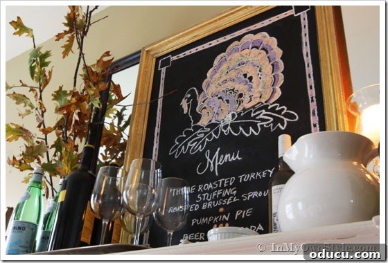 Turkey-chalkboard drawing A DIY chalkboard featuring a festive turkey drawing, perfect for Thanksgiving.