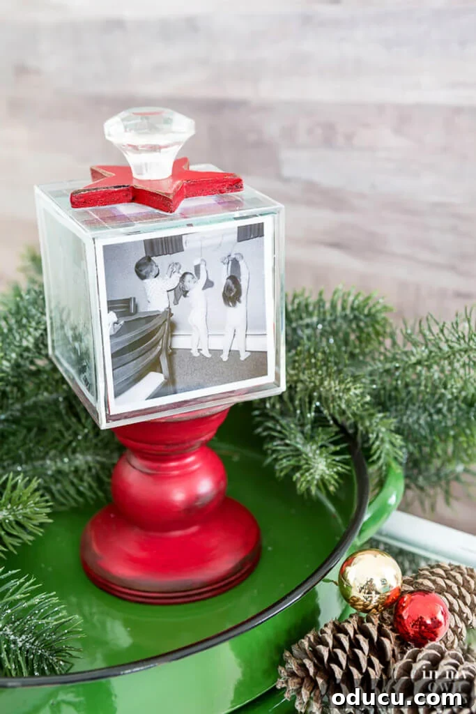 Christmas pedestal photo cube on green tray
