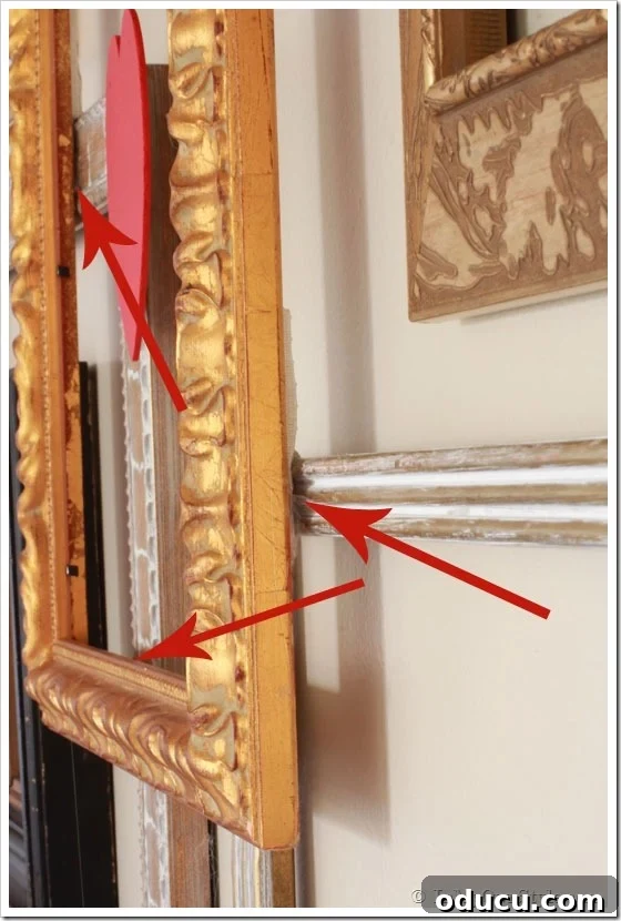 How to layer frames on a wall photo gallery How to layer frames on a wall photo gallery