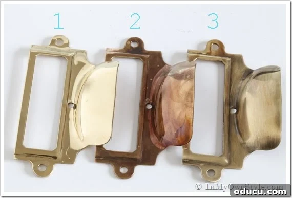Instant Brass Patina: A 5-Minute Method 8 Three brass drawer pulls demonstrating different aging levels: bright un-lacquered, lightly aged, and deeply antiqued.