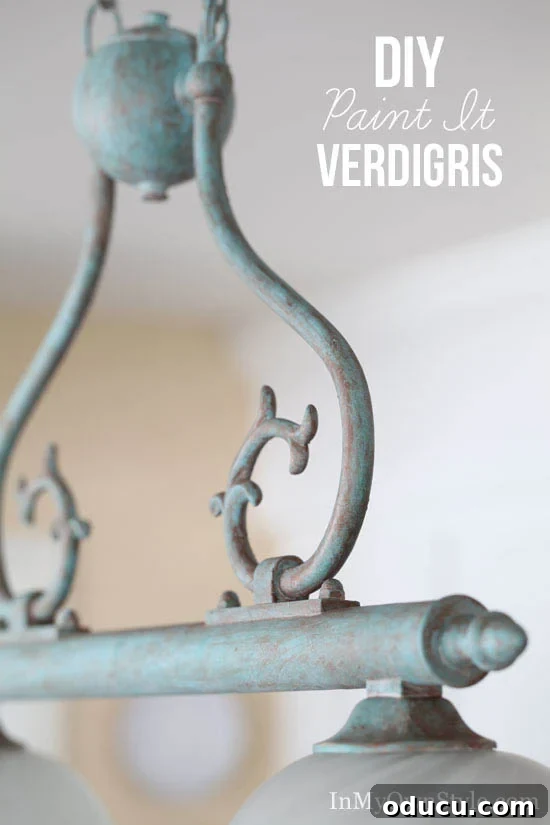 Instant Brass Patina: A 5-Minute Method 10 Step-by-step guide on how to paint a Verdigris finish on a brass light fixture for a faux aged look.