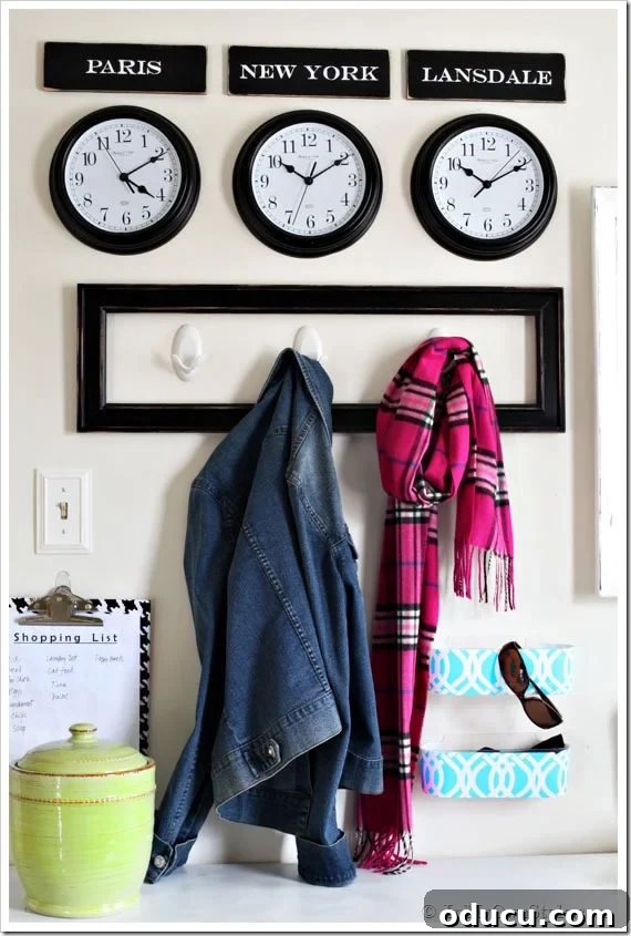 Creative Mudroom Organizing Ideas featuring a 'Grand Central Station' theme with city clocks and custom signs, enhanced with Command Brand Products for damage-free hanging.