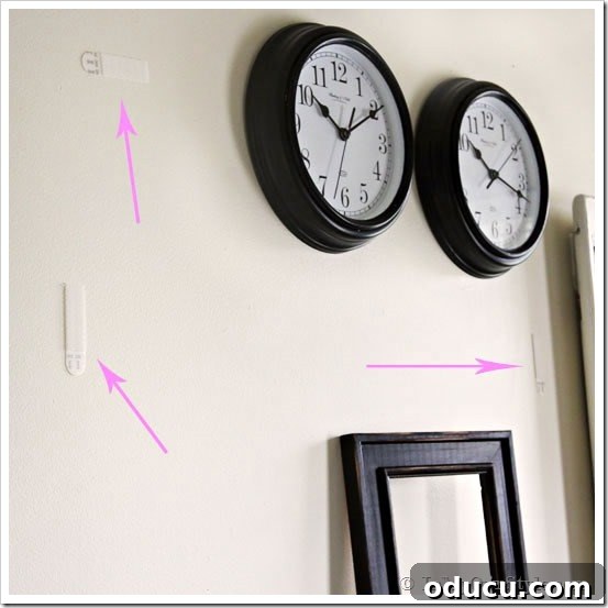 3M-Mudroom-1hour Instructional image showing how to re-mount wall art or clocks after allowing Command Brand strips to adhere for an hour.